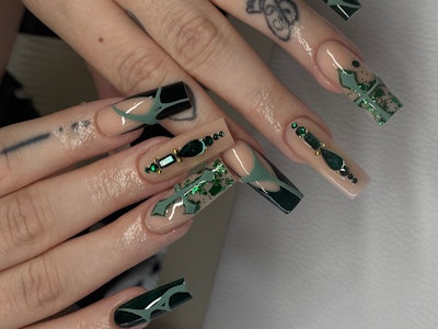 Black and emerald nail art