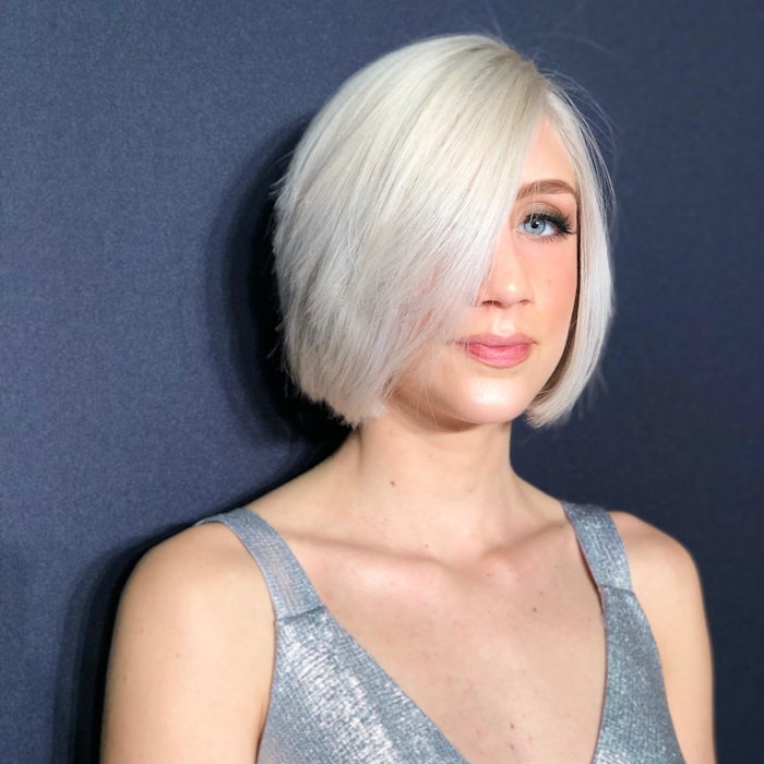 Client sporting pastel/platinum blonde hair.