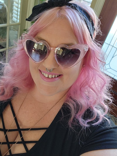 Client with bubblegum pink hair.