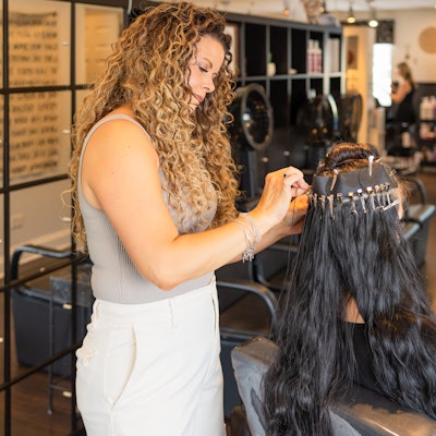 Jennifer installing Adored Extensions on a client.