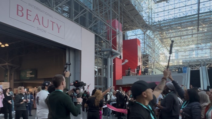 Attendees wait to be let into the show floor at the first day of IBS NY at the Javits Center.