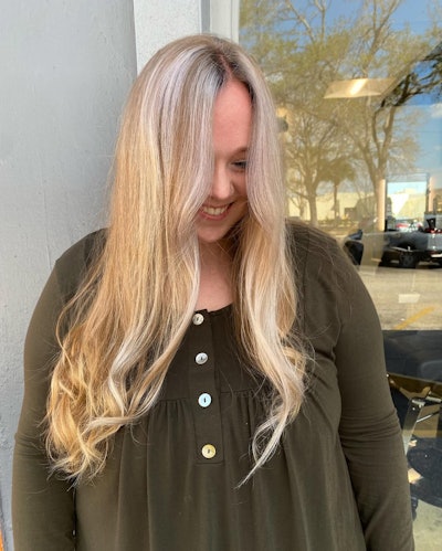 Client with long, wavy blonde hair