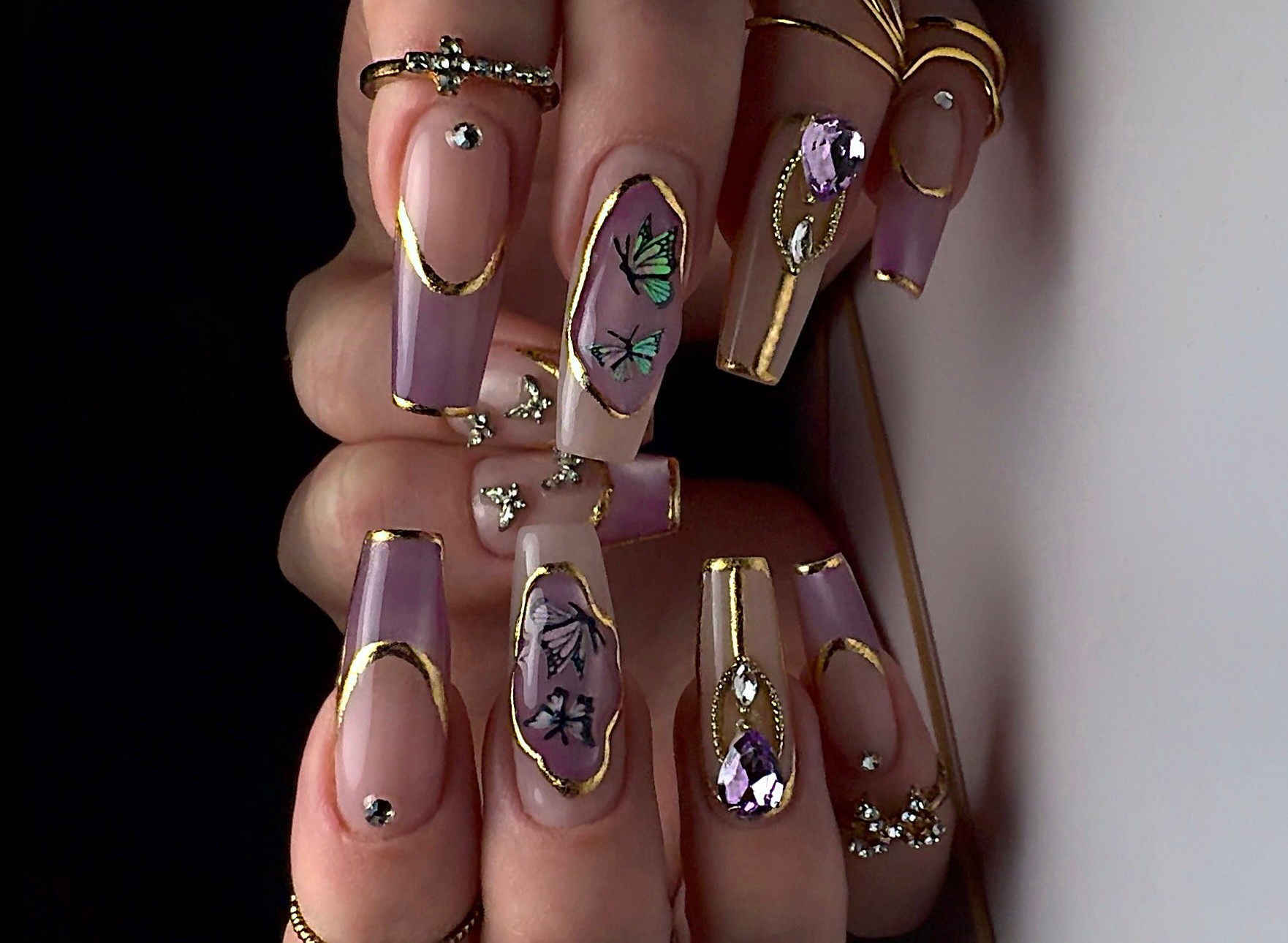 Purple and gold butterfly nails