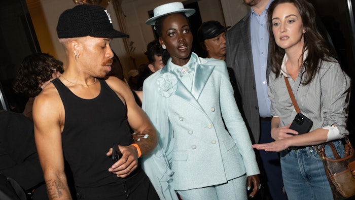 Vernon Francois and Lupita Nyong'o behind the scenes of the 2025 Met Gala.