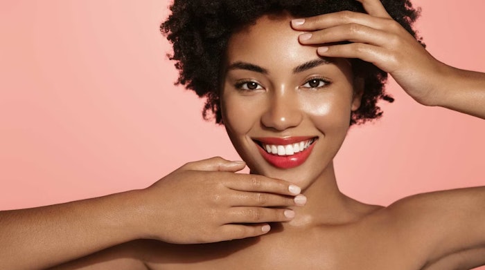 Beautiful Brown Woman With Glowing Skin Short Kinky Hair