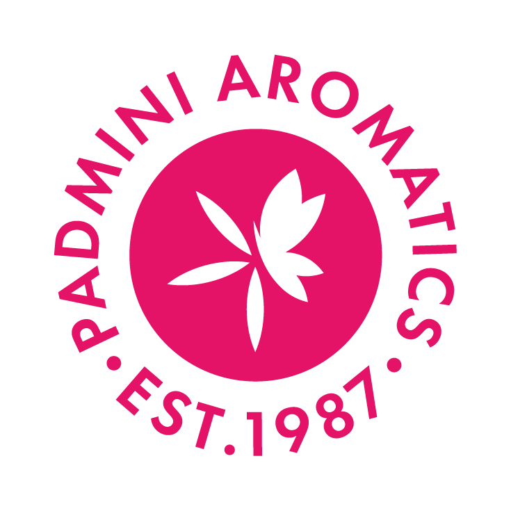 Padmini Aromatics logo featuring a white four-petaled flower in a magenta circle with circular text established 1987
