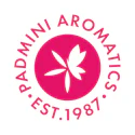 Padmini Aromatics logo featuring a white four-petaled flower in a magenta circle with circular text established 1987