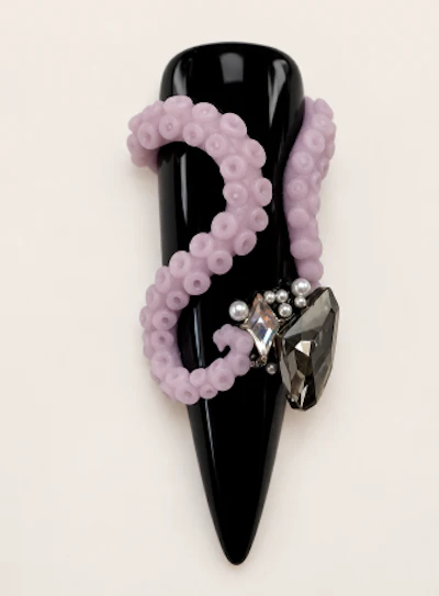 Beaded bracelet with black cone pendant, lavender amethyst beads, and silver charms